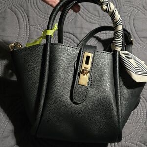 Elegant Black Satchel with Gold Accents